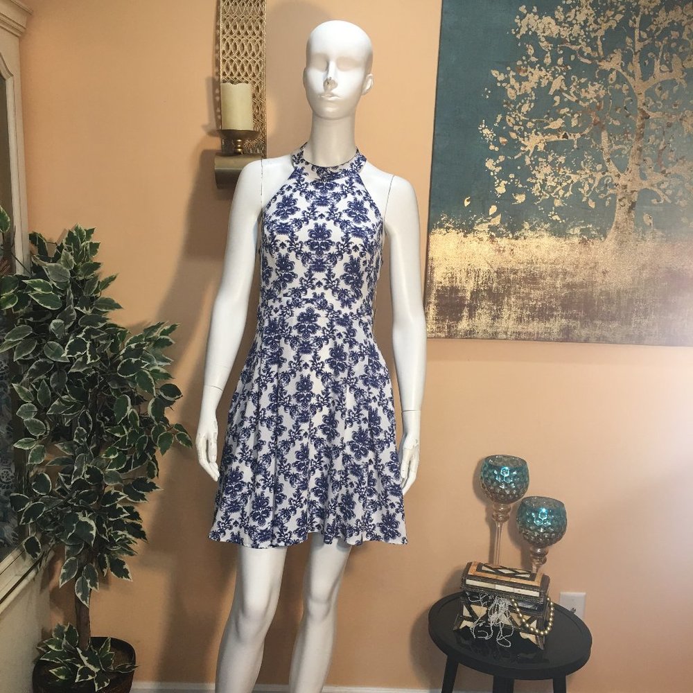 B. Darlin Blue and white floral halter neck dress with pockets and zip back